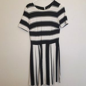 LOFT black and white striped knee length dress with sleeves! Size 4.
